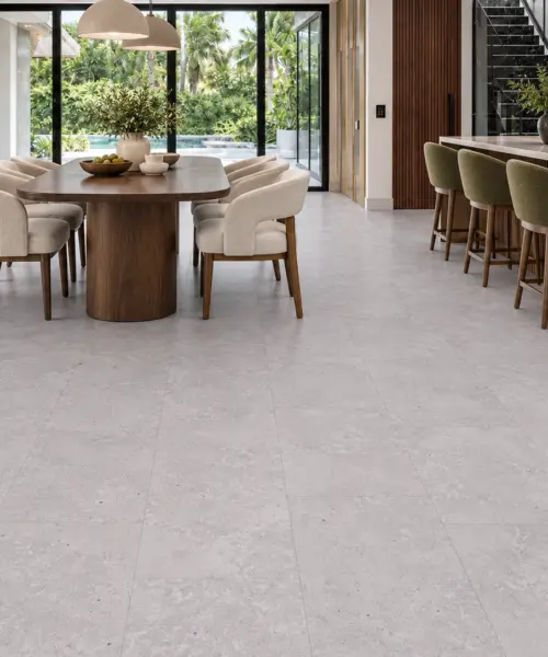 Bright Stone installed flooring in a furnished daylight interior; accurate product scale visualization (MBrSt7.5)