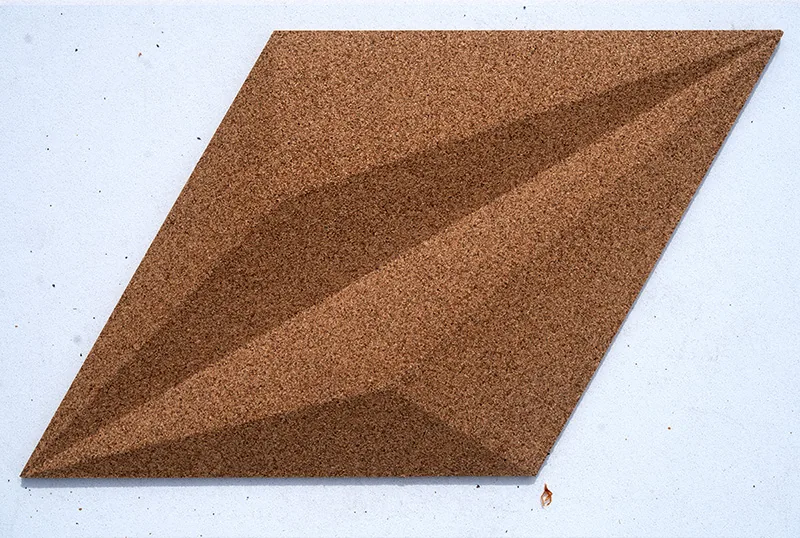 Geometric natural cork decorative wall panel.