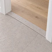 Creme Royale Marble T-molding transition — installed view