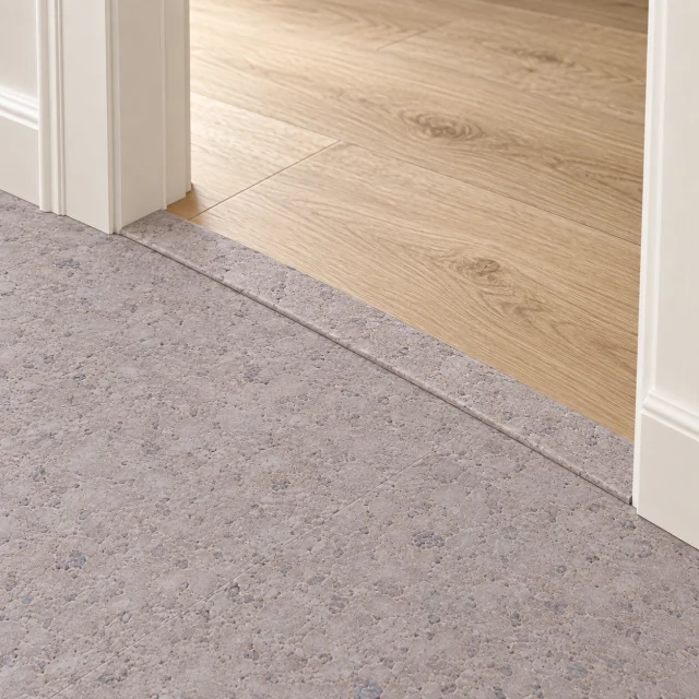 Grano T-molding transition — installed view with product profile inset