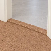 Shoreline T-molding transition — installed view