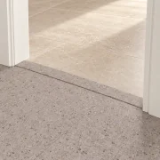 Terrazzo T-molding transition — installed view