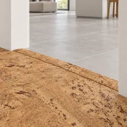 Umber T-molding transition — installed view