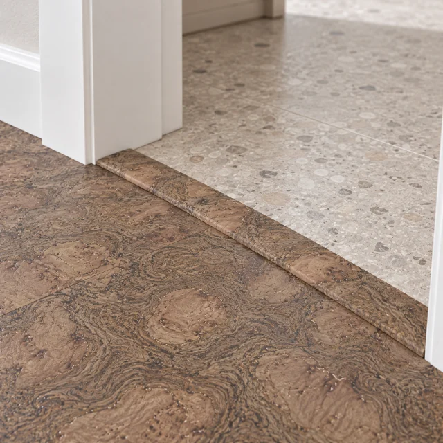 Walnut Burlwood T-molding transition — installed view with product profile inset