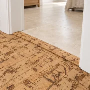 Woodflow T-molding transition — installed view