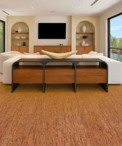 Amber Streak - 1/2&Quot; (12Mm) - Cork Floating (Fast12) Amber Streak Cork Floor In A Cozy Living Room With White Sectional Sofa, Wood Accents, And Large Windows.