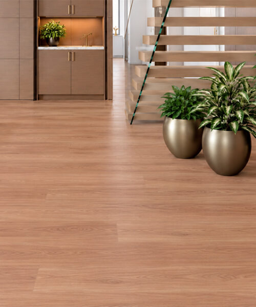 Warm-Toned American Red Oak Cork Floor Planks Run Through An Entryway With Glass Railing, Open Stairs, And Planters.