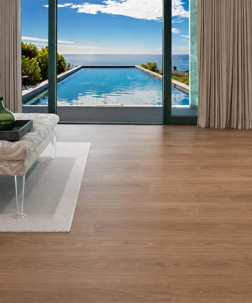 American Red Oak Cork Flooring In A Modern Living Room With Ocean And Pool Views