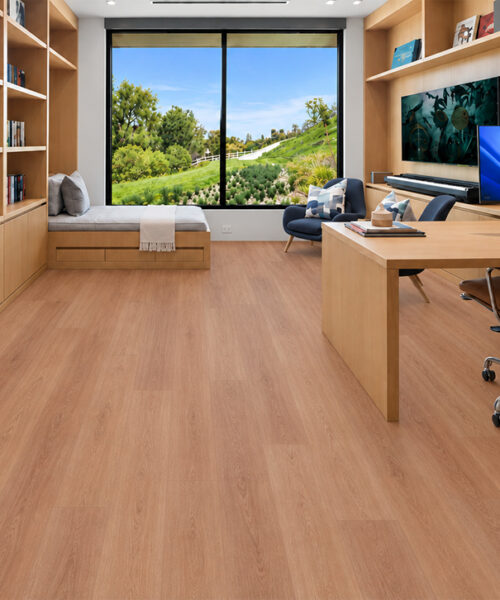 Warm American Red Oak Cork Flooring For An Office Complements Wood Bookshelves, A Large Desk, And Window Seating.