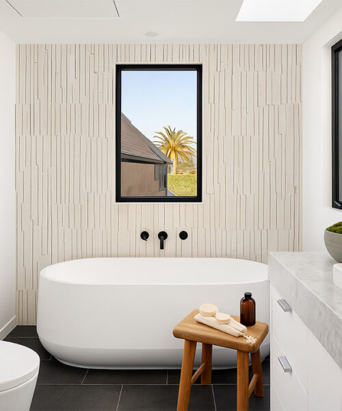 Eco-Friendly Arctic Slate Cork Wall Panels Installed Behind A Bathtub, Providing Sound Insulation And Modern Texture