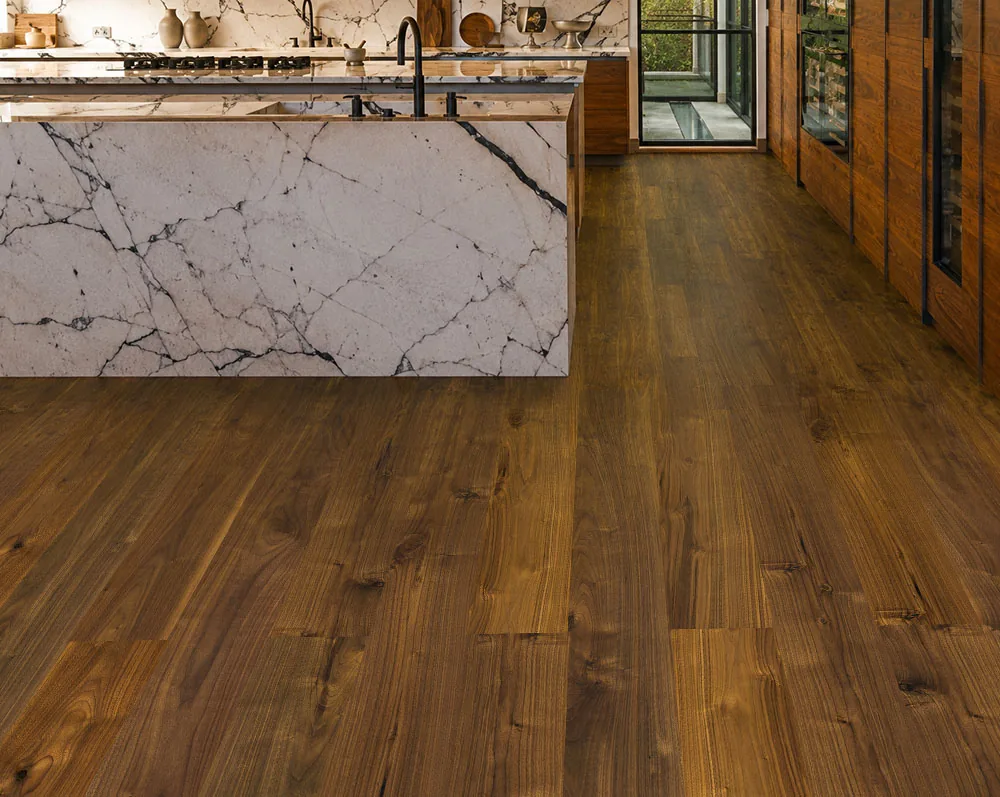 Ashen Chestnut - 7/16&Quot; (11Mm) - Swiss Design Cork Floating (Fascnut11) Ashen Chestnut 11Mm Cork Flooring In A Contemporary Kitchen With A Marble Island And Wood Cabinetry.