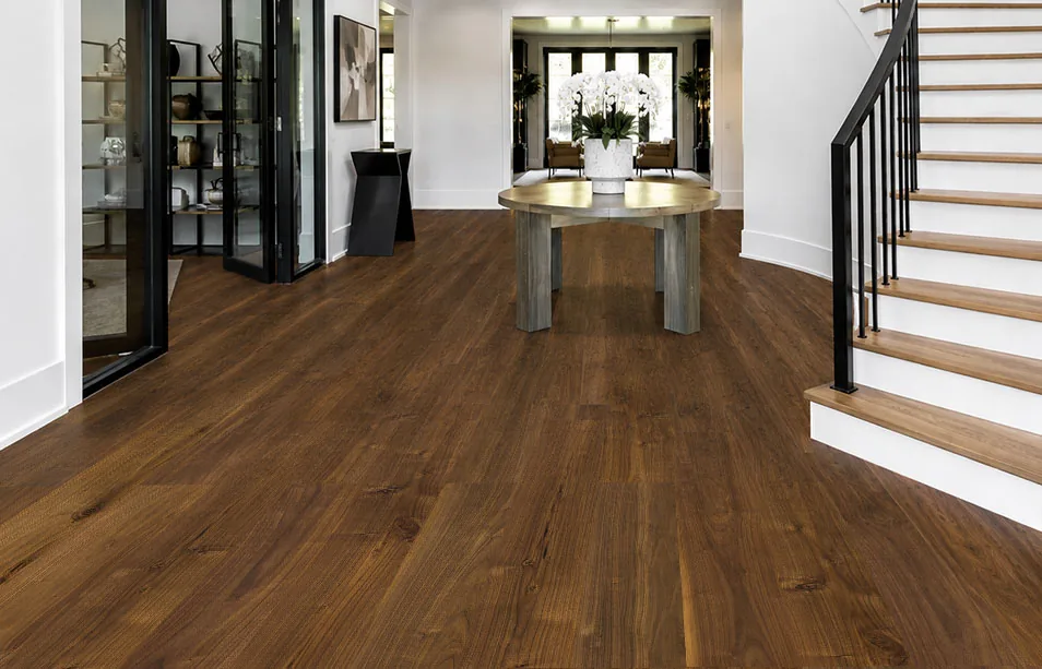 Ashen Chestnut - 7/16&Quot; (11Mm) - Swiss Design Cork Floating (Fascnut11) Ashen Chestnut Wood-Look Cork Flooring In A Modern Entryway Beside A Contemporary Staircase.