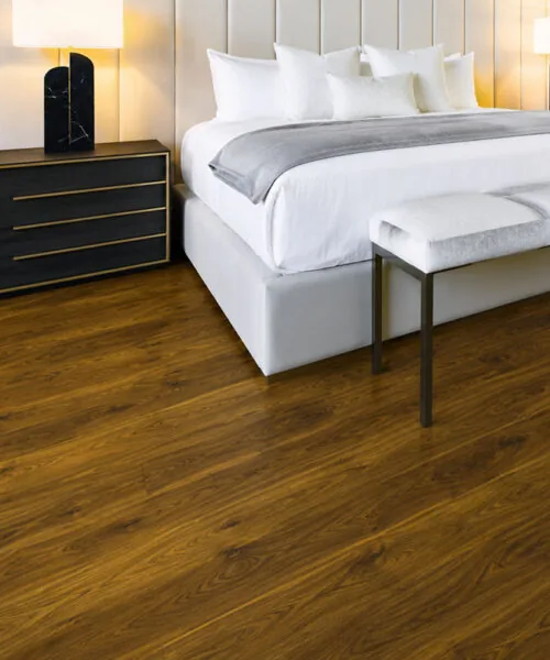 Ashen Chestnut - 7/16&Quot; (11Mm) - Swiss Design Cork Floating (Fascnut11) Ashen Chestnut 11Mm Cork Floating Flooring In A Luxury Bedroom With Warm Brown Grain Patterns.