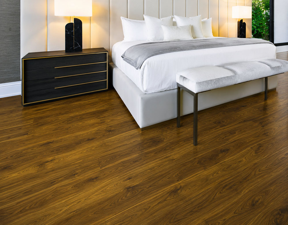 Ashen Chestnut - 7/16&Quot; (11Mm) - Swiss Design Cork Floating (Fascnut11) Ashen Chestnut 11Mm Cork Floating Flooring In A Luxury Bedroom With Warm Brown Grain Patterns.