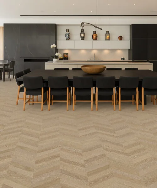 Aurora Chevron - 7/16″ (11Mm) - Swiss Design Cork Floating (Fauro11) Aurora Chevron Cork Flooring In An Open Kitchen And Dining Room – Waterproof, Elegant, And Sustainable Floor Design.