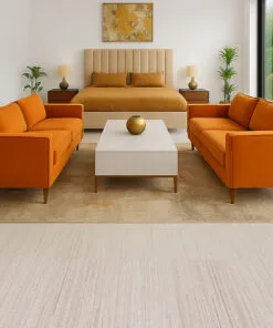 Stylish Bedroom With Mid-Century Orange Sofas And Vertical Swiss Cork Flooring, Creating A Cozy, Warm, And Allergen-Free Living Space.