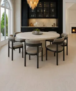 Bleached Birch cork flooring in a modern dining room with round table and soft neutral decor.