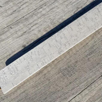 Bleached birch cork flooring t molding transition threshold.