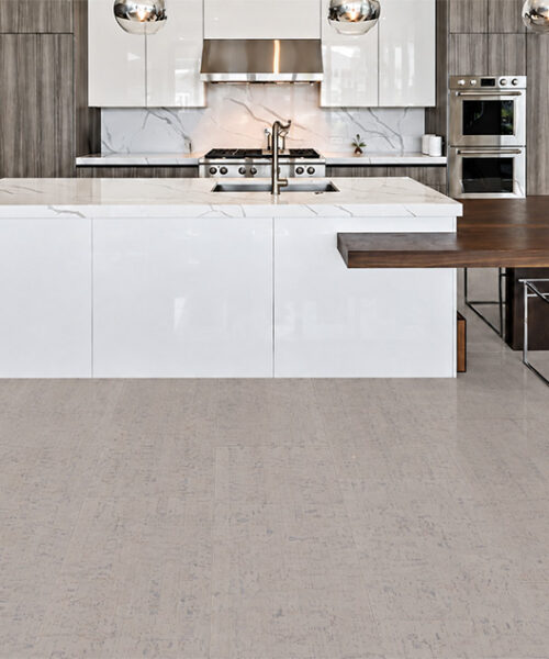 Bleached Birch - 5/16&Quot; (8Mm) - Cork Glue Down Tile (Gbb8) Bleached Birch 12Mm Off-White Cork Flooring With Linear Grain Surrounds A Modern White Kitchen Island.