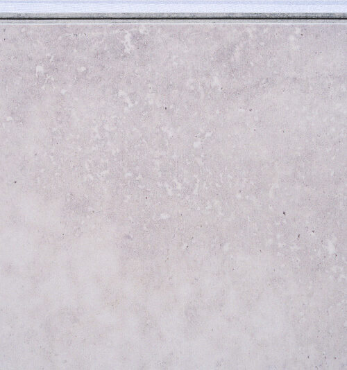 Bright Stone Swiss TechSlate flooring featuring a realistic gray slate stone appearance and durable natural cement fiberboard construction.