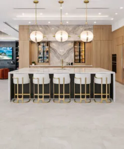 Bright Stone Swiss Techslate stone-look flooring in luxury kitchen with large island and modern cabinetry