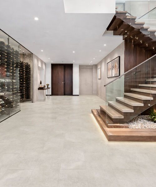 Bright Stone - 19/64&Quot; (7.5Mm) - Swiss Techslate (Mbrst7.5) Bright Stone Swiss Techslate Stone-Look Flooring In Contemporary Staircase Hall With Glass Railing