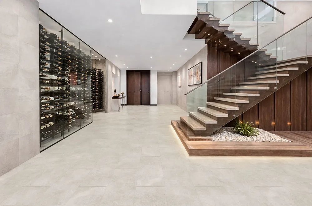 Bright Stone - 19/64&Quot; (7.5Mm) - Swiss Techslate (Mbrst7.5) Bright Stone Swiss Techslate Stone-Look Flooring In Contemporary Staircase Hall With Glass Railing