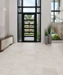 Bright Stone Swiss Techslate flooring in modern luxury entryway with large-format stone look tiles