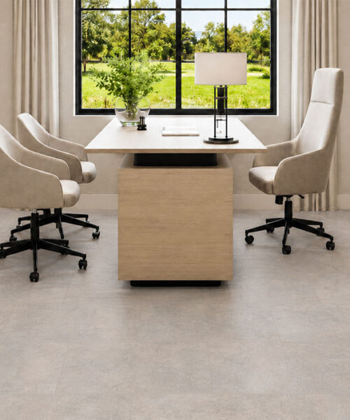 Bris Stone Gray-Beige Stone-Look Cork Flooring With Matte Planks Complements A Garden-View Home Office.