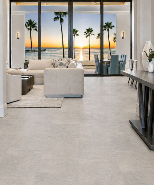 Warm Stone - 7/16&Quot; (11Mm) - Swiss Design Cork Floating (Fwmst11) Bris Stone Gray-Beige Floating Cork Flooring Leads Through An Entryway With A Console Table And Sunset Views.