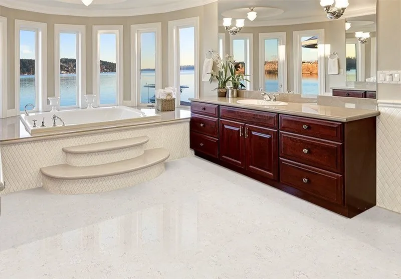 Is Forna Cork Flooring Cork Tile And Cork Underlayment Waterproof Ceramic Marble Forna Waterproof Cork Tiles In Luxurious Master Bathroom Interior Boasts Jetted Tub With Curved Windows Facing The Lake Cherrywood Vanity Cabinets