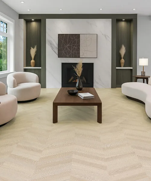Bright contemporary living room featuring Clara Chevron cork floating flooring with a soft light-beige chevron pattern.