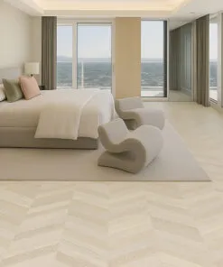 cean-view bedroom with minimalist décor and Clara Chevron cork floating flooring in a pale chevron design.