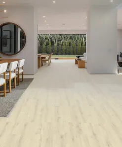 Spacious Combined Living And Dining Area With Como Oak White Swiss Cork Design Floating Flooring, Modern Wood Table, And Large Circular Mirror.