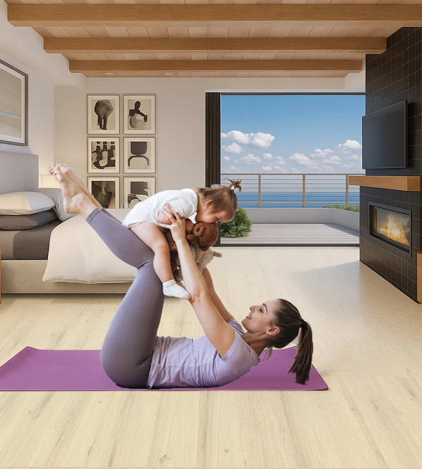 Como Oak White - 7/16&Quot; (11Mm) - Swiss Design Cork Floating (Fcow11) Bedroom With Ocean View And Como White Oak Swiss Cork Design Flooring, Featuring Mother Doing Yoga With Child On A Purple Mat