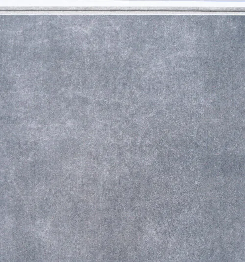 Concrete Alloy Swiss TechSlate flooring featuring a modern gray concrete appearance with subtle industrial texture and a contemporary cement-look surface.