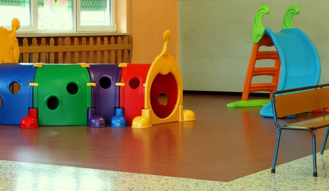 Golden Beach cork glue-down tile flooring installed in a kindergarten daycare playroom