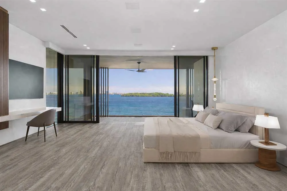 Earthy Pine Swiss Real Linoleum Waterproof Flooring In A Luxury Bedroom With Ocean View, Ideal For Commercial And Hotel Interiors.