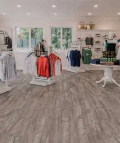 Retail Clothing Store Featuring Earthy Pine Swiss Real Linoleum Waterproof Commercial Flooring.