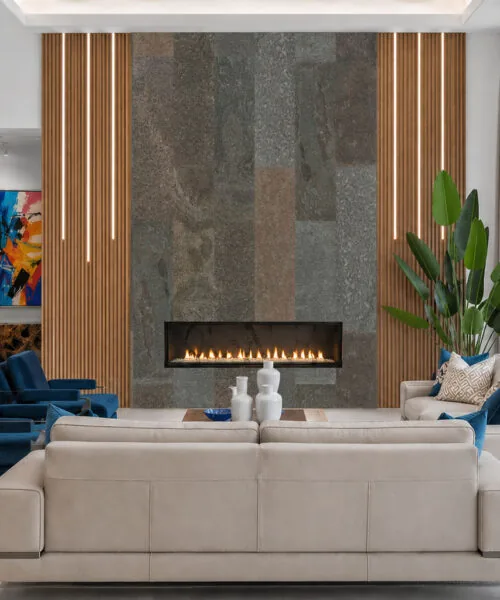 Gold Mica Slate Real Stone Tiles Fireplace Feature Wall Paired With Vertical Wood Slats In A Modern Luxury Living Space