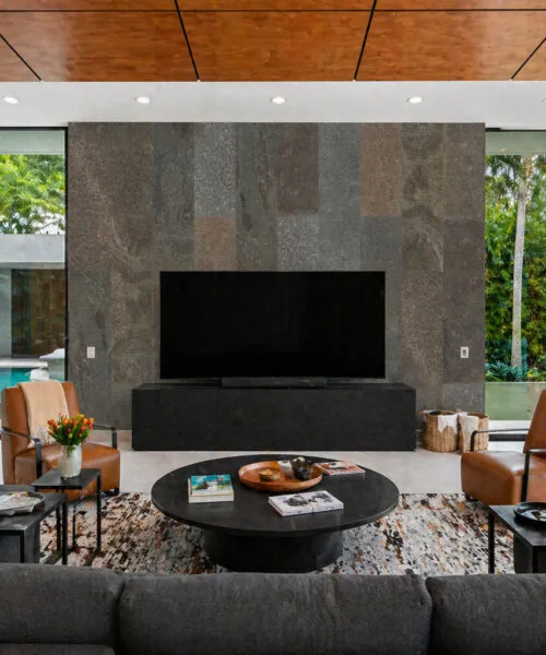 Gold Mica Slate Real Stone Tiles On A Living Room Tv Wall Creating A Contemporary Stone Accent With Rich Texture And Subtle Gold Highlights