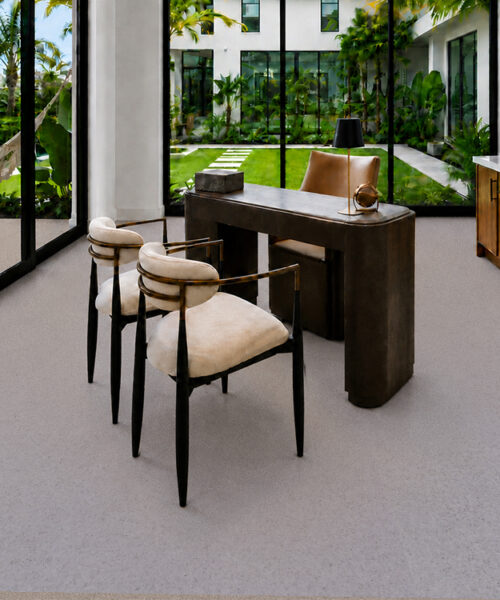 Gray-white Grano 10mm Cork Floating Flooring with organic grain complements a garden-view home office.