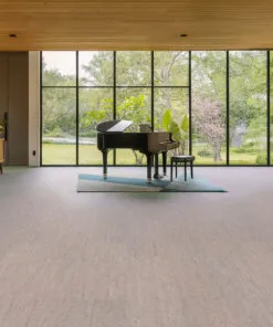 Modern Living Room With Floor-To-Ceiling Windows, Featuring A Grand Piano On Gray Bamboo Cork Flooring.