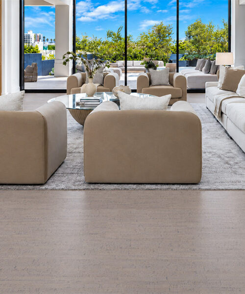 Gray Bamboo - 1/2&Quot; (12Mm) - Cork Floating (Fgb12) Gray Bamboo Taupe Floating Cork Flooring Frames Cream Sofas, A Fireplace, And Floor-To-Ceiling Garden Windows.