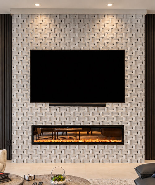 Greece White - 63/64&Quot; (25Mm) - 3D Cork Wall Panels (Wgwh25) Greece White 3D Cork Wall Panels With A Woven Geometric Texture Surrounding A Tv And Linear Fireplace In A Modern Living Room.