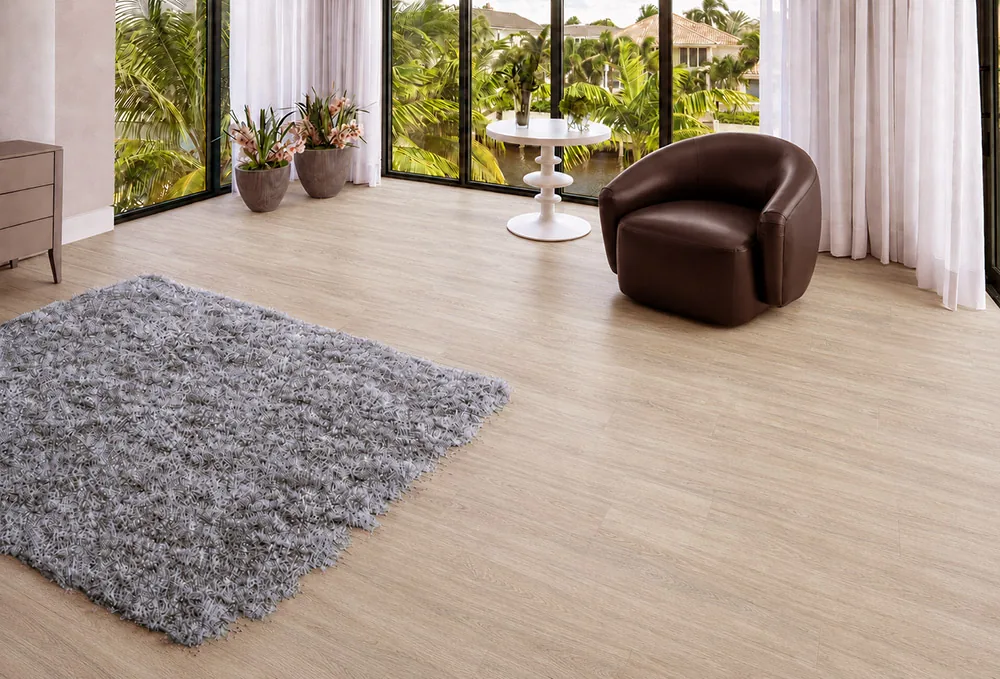 Hamilton - 7/16&Quot; (11Mm) - Swiss Design Cork Floating (Fham11) Hamilton Warm Gray Wood-Grain Cork Flooring In A Sunlit Sitting Room With Floor-To-Ceiling Windows