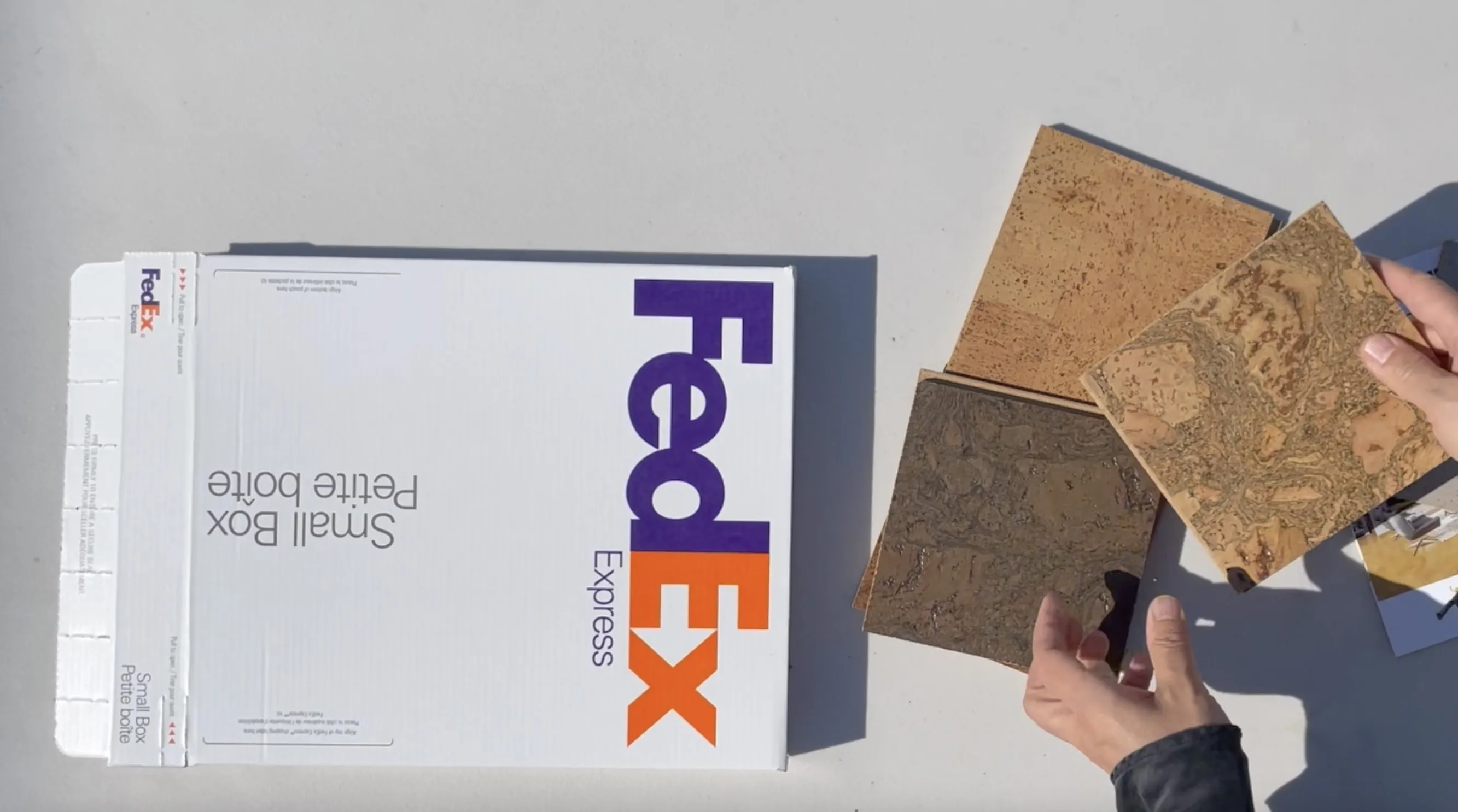 Icorkfloor Cork Flooring Samples Beside A Fedex Express Box