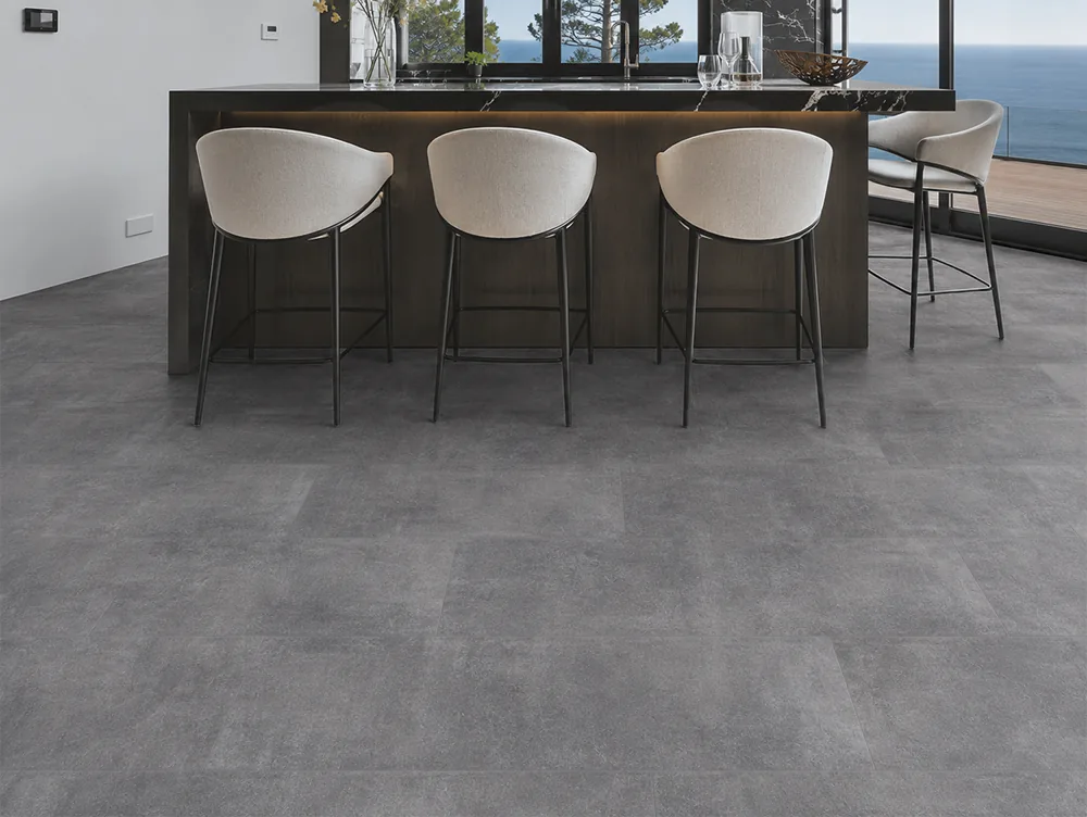 Industrial Grey - 3/8&Quot; (9.5Mm) - Forna Natural Composite Flooring With Waterproof Hydrowood Core (Nindg9.5) Concrete Gray Forna Natural Composite Flooring Beneath A Modern Kitchen Island And Breakfast Bar