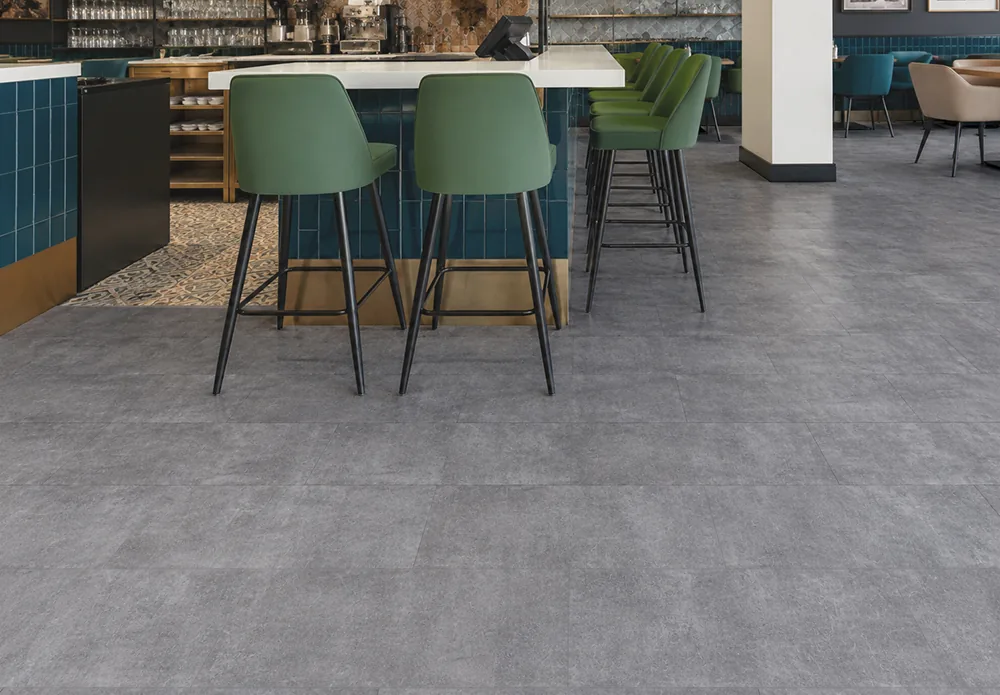 Industrial Grey - 3/8&Quot; (9.5Mm) - Forna Natural Composite Flooring With Waterproof Hydrowood Core (Nindg9.5) Durable Gray Concrete Look Flooring In A Stylish Restaurant Or Café Bar