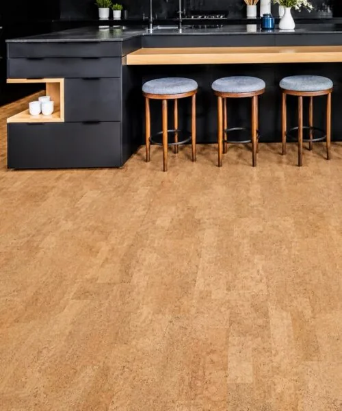 Leather - 1/4&Quot; (6Mm) - Cork Glue Down Tile (Gle6) Leather Natural 12Mm Cork Floating Flooring In A Modern Black Kitchen With A Large Island And Wood Accents.